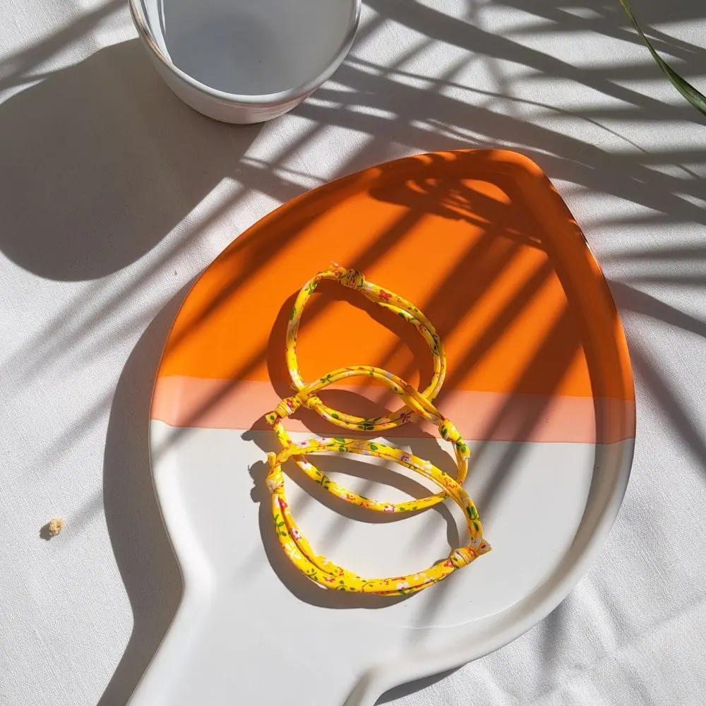 Bracelet réglable "Jonquille" en soutien à l'Institut Curie